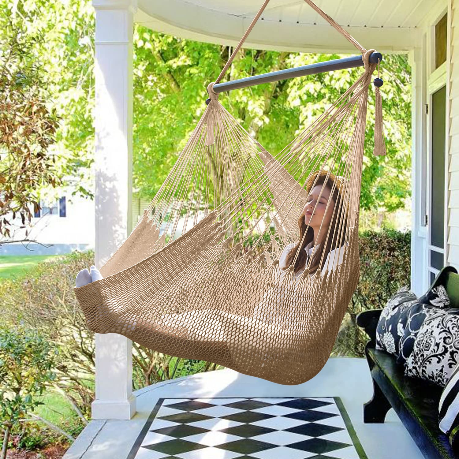Bathonly front view of hammock chair showing roomy seat and light brown color for comfortable lounging