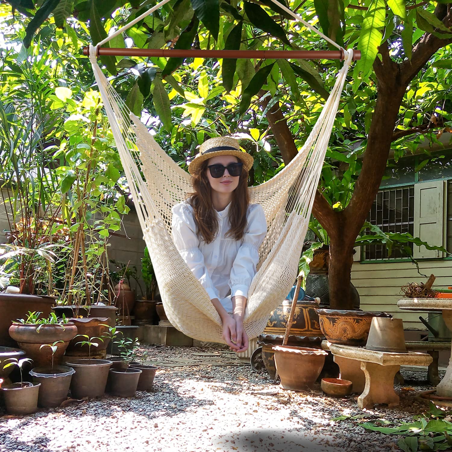 Bathonly person sitting in XL hammock showing full-body coverage and scale