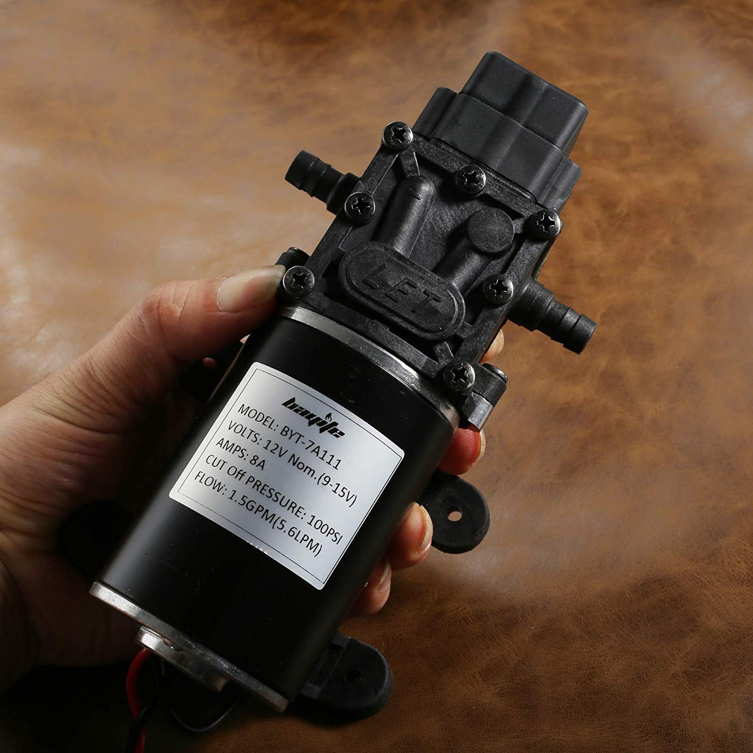 bayite held in hand for scale illustrating compact size and easy mounting advantage