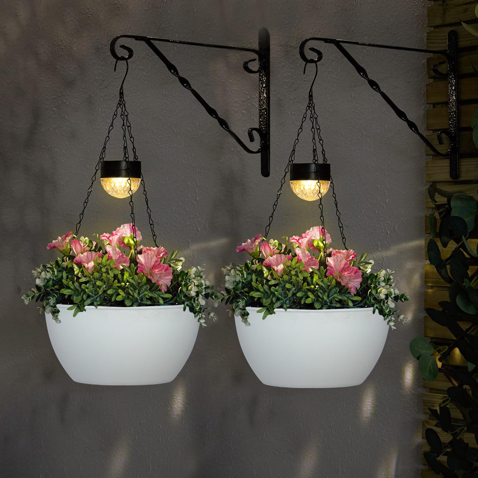 BAYN porch scene at dusk with lit hanging planters creating warm ambient lighting