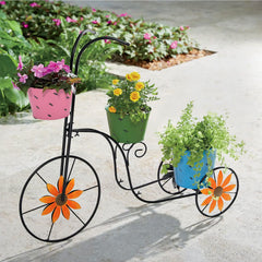 BAYN tricycle planter front view showing colorful pots and black iron frame for visual appeal