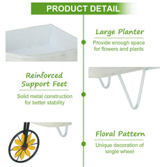 BAYN wheelbarrow next to potted plant for scale, helps visualize actual planter dimensions