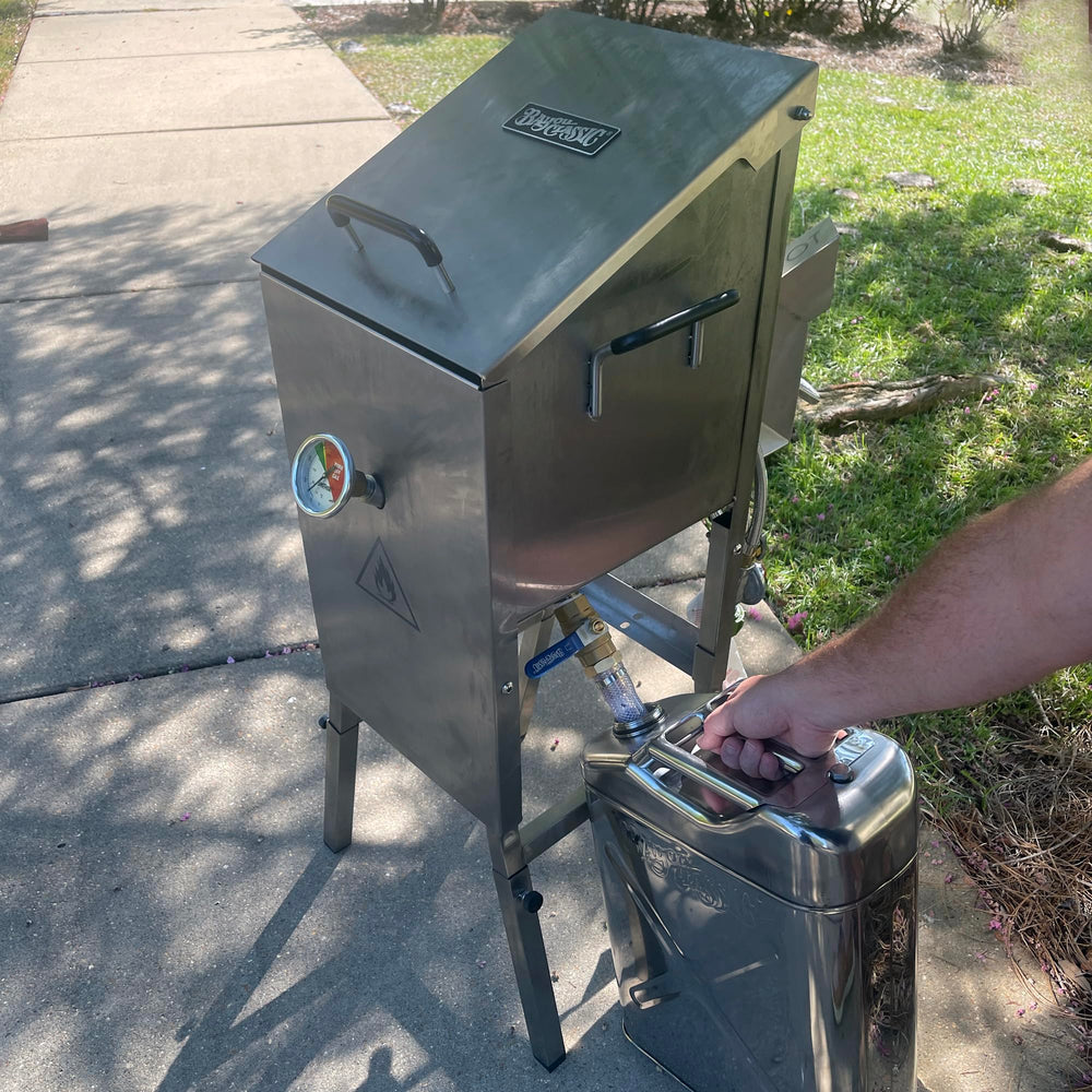 Bayou Classic hose attached to fryer delivering safe spill-free draining