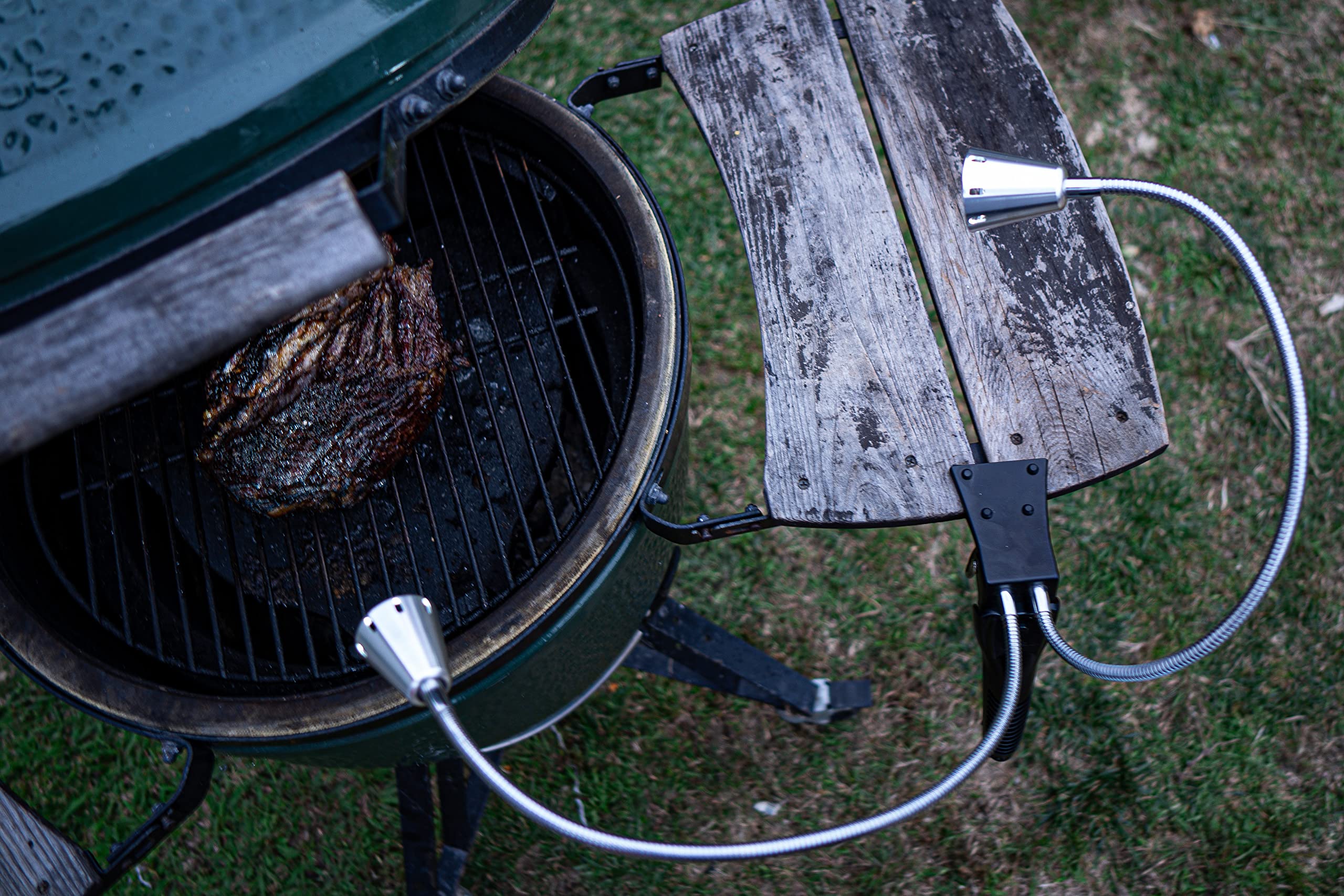 BBQ Dragon attached to a pellet grill delivering broad illumination across the cooking area