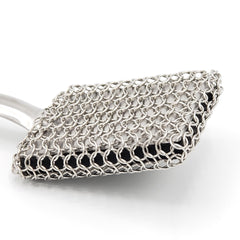 BBQ Dragon image of the built-in metal scraper highlighting targeted baked-on residue removal
