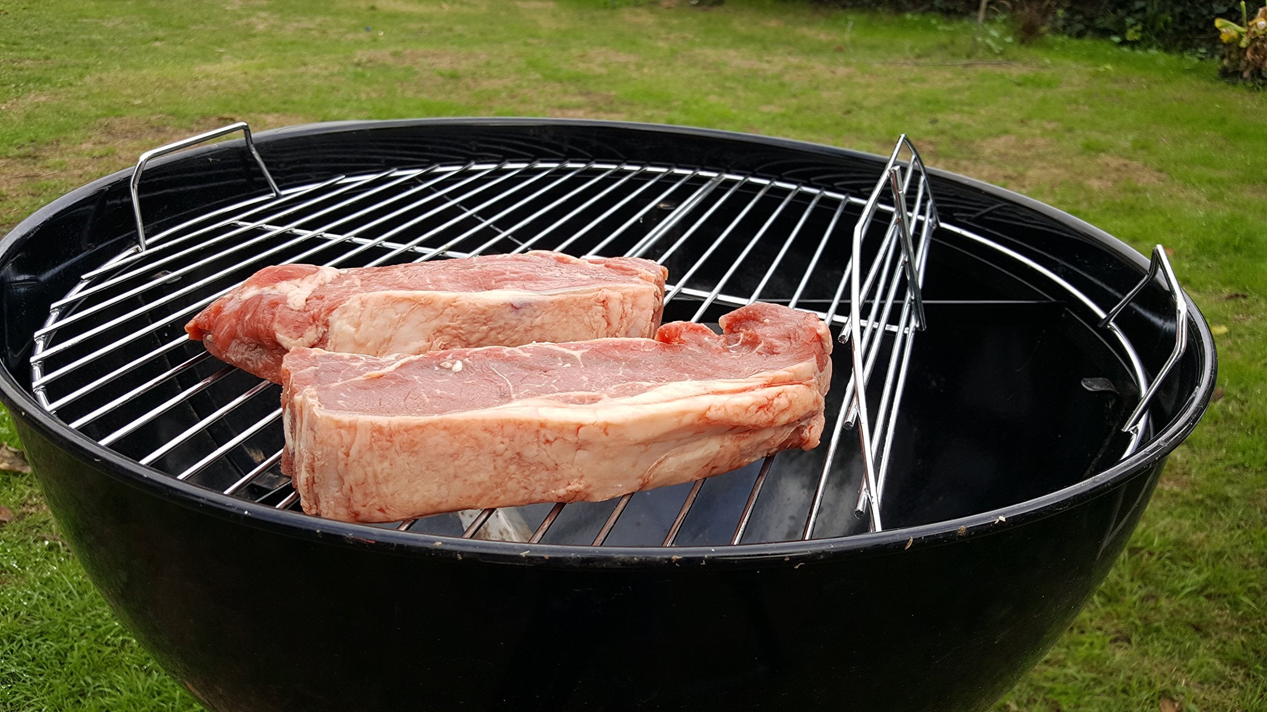 BBQ Dragon center hub close-up showing smooth rotation and easy flare-up control benefit