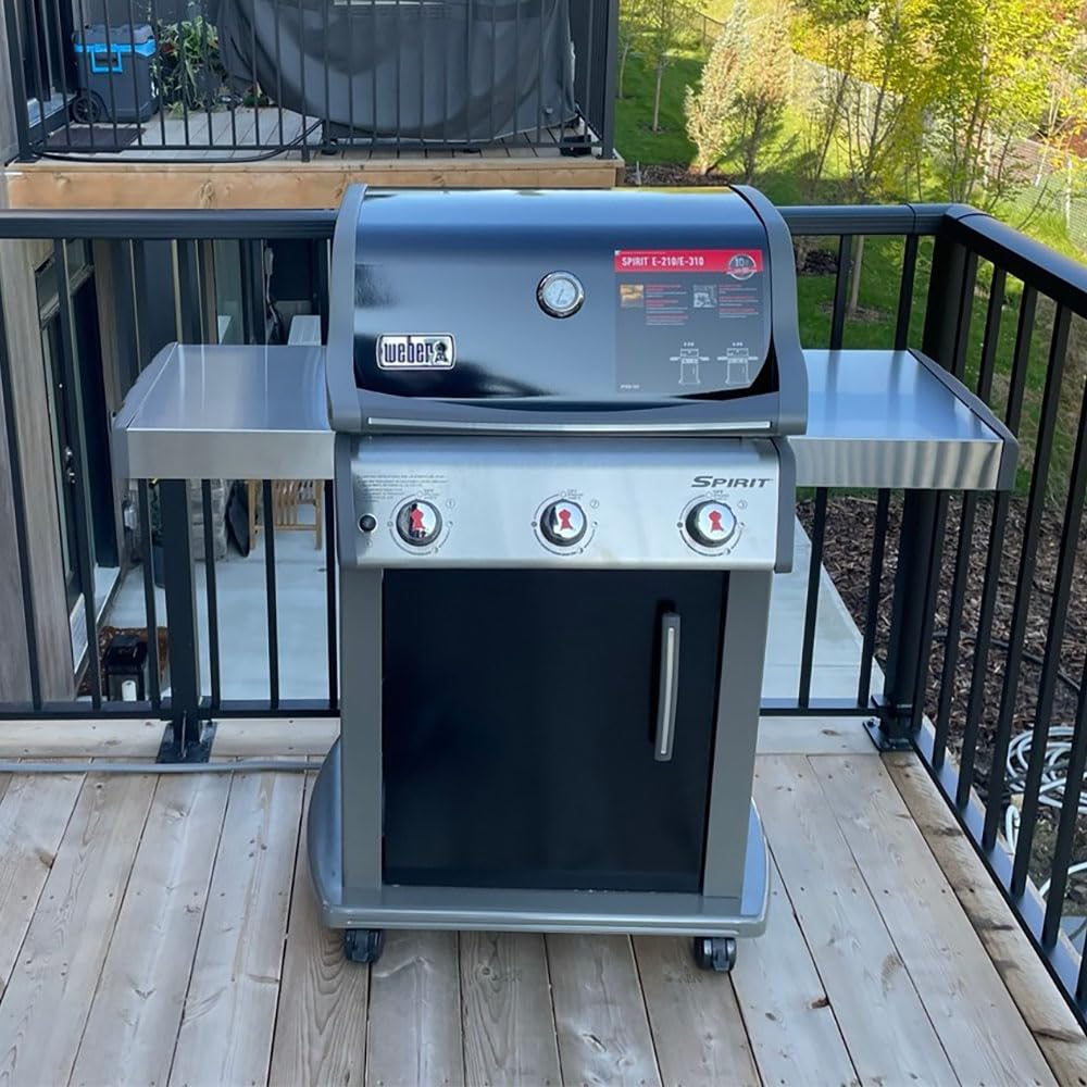 BBQ-PLUS lifestyle shot of grill on patio with new casters for secure positioning