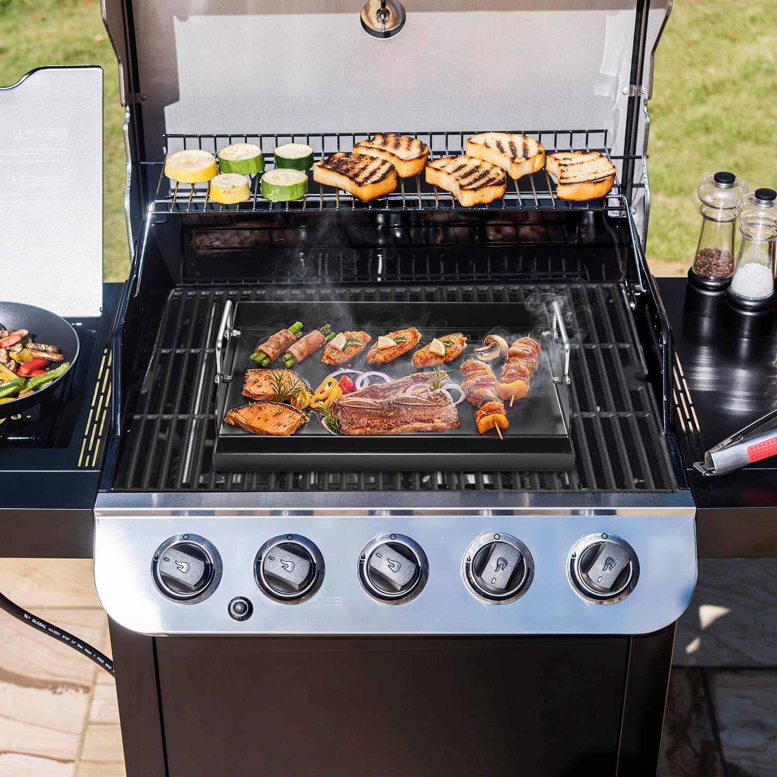 BBQ-Yummy griddle next to utensils showing true 17x13 inch scale benefit