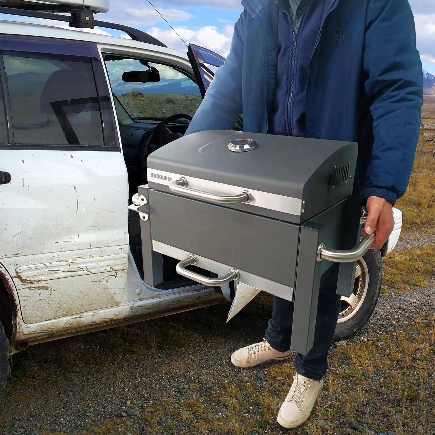 BBQCuker open lid revealing warming rack to keep food hot while finishing