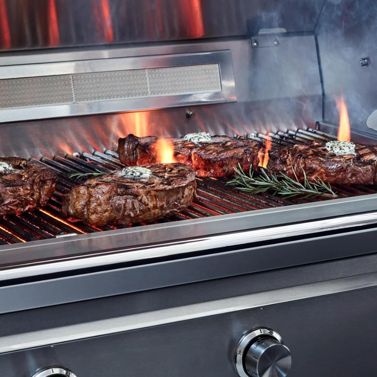 BBQration briquettes covering burner to protect against grease and flare-ups