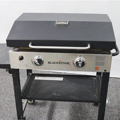 BBQration lid open from front demonstrating hands-free access while cooking