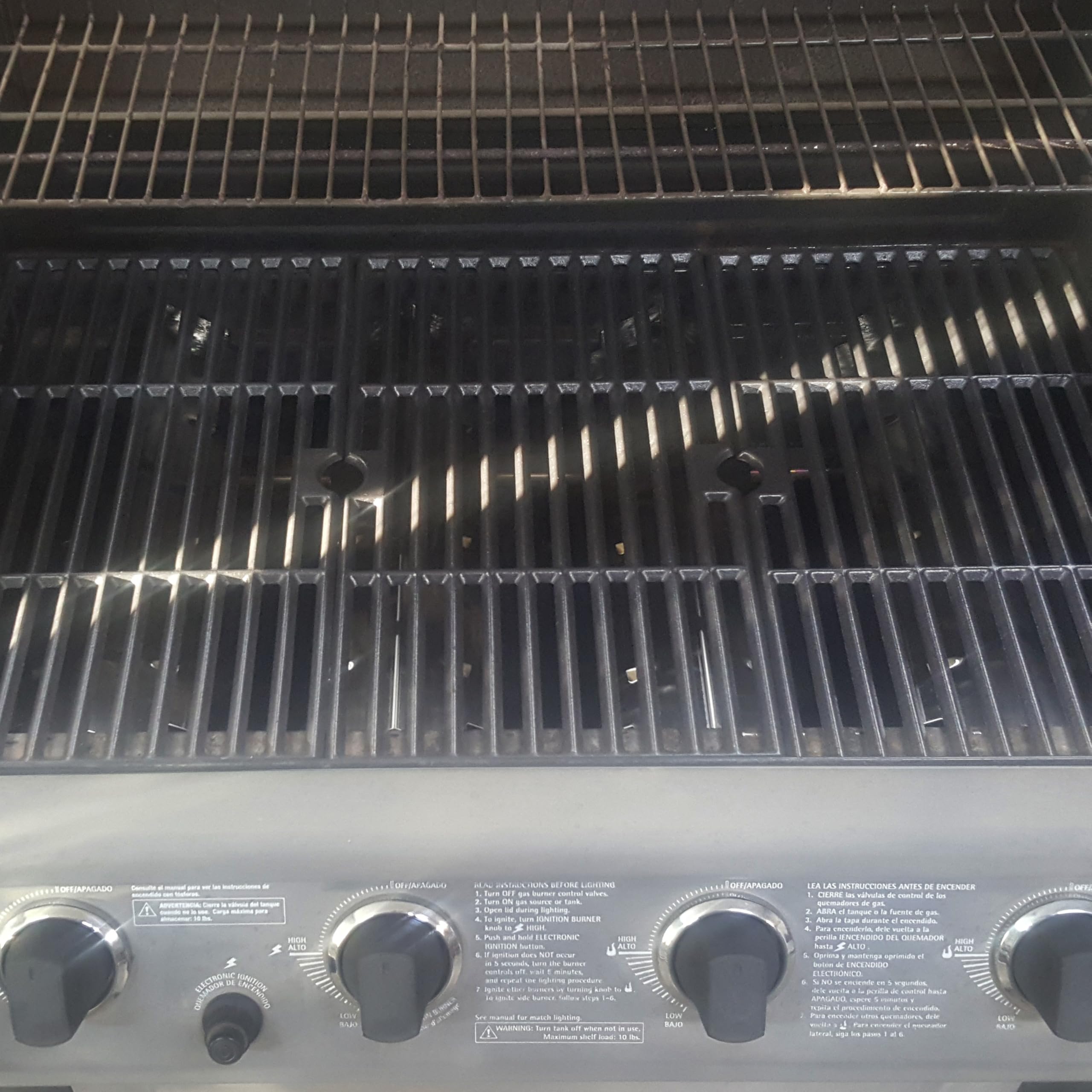 BBQration ruler beside grate for scale showing accurate 18 1/8 inch length measurement