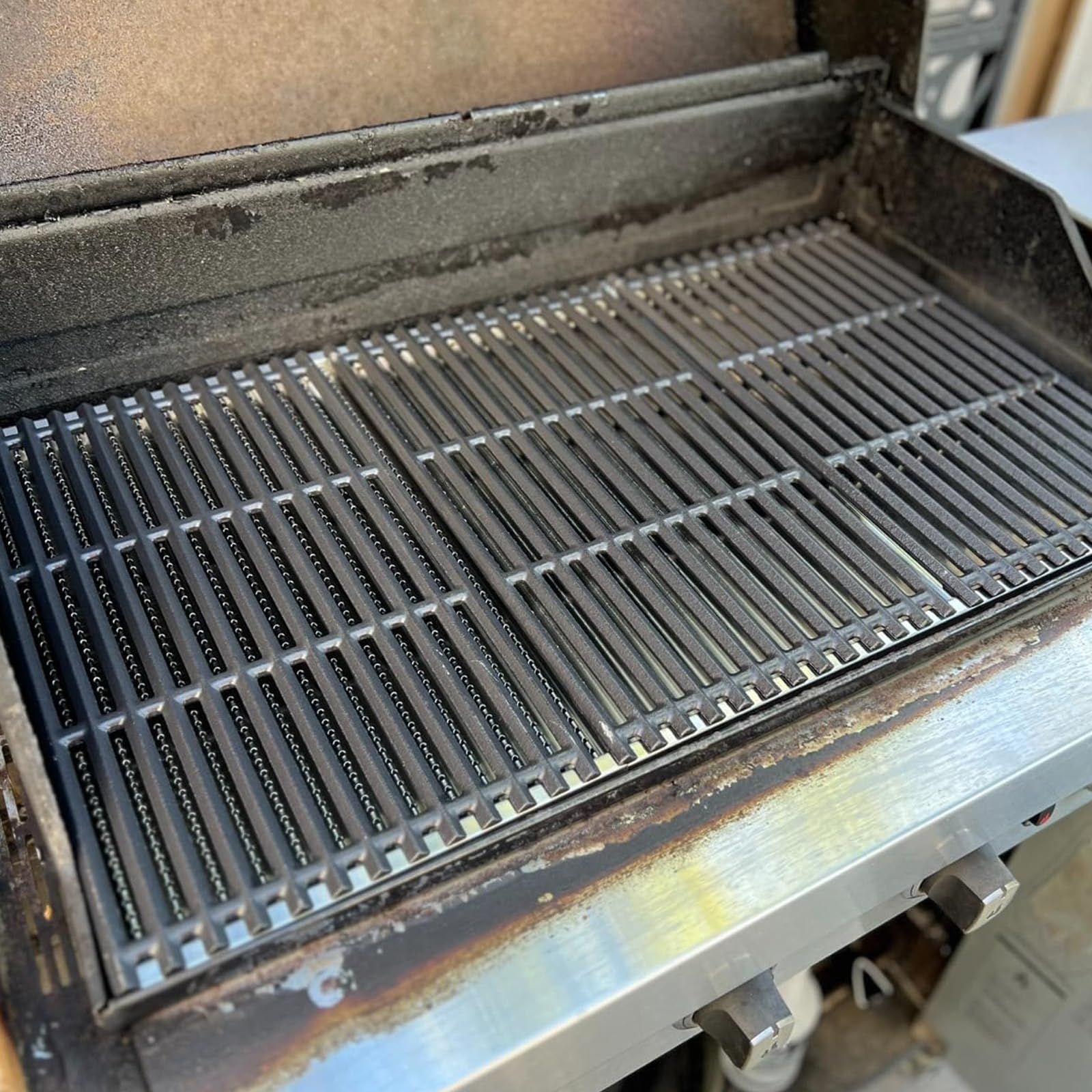 BBQration ruler beside grate showing 17 by 9.5 inch dimensions for scale