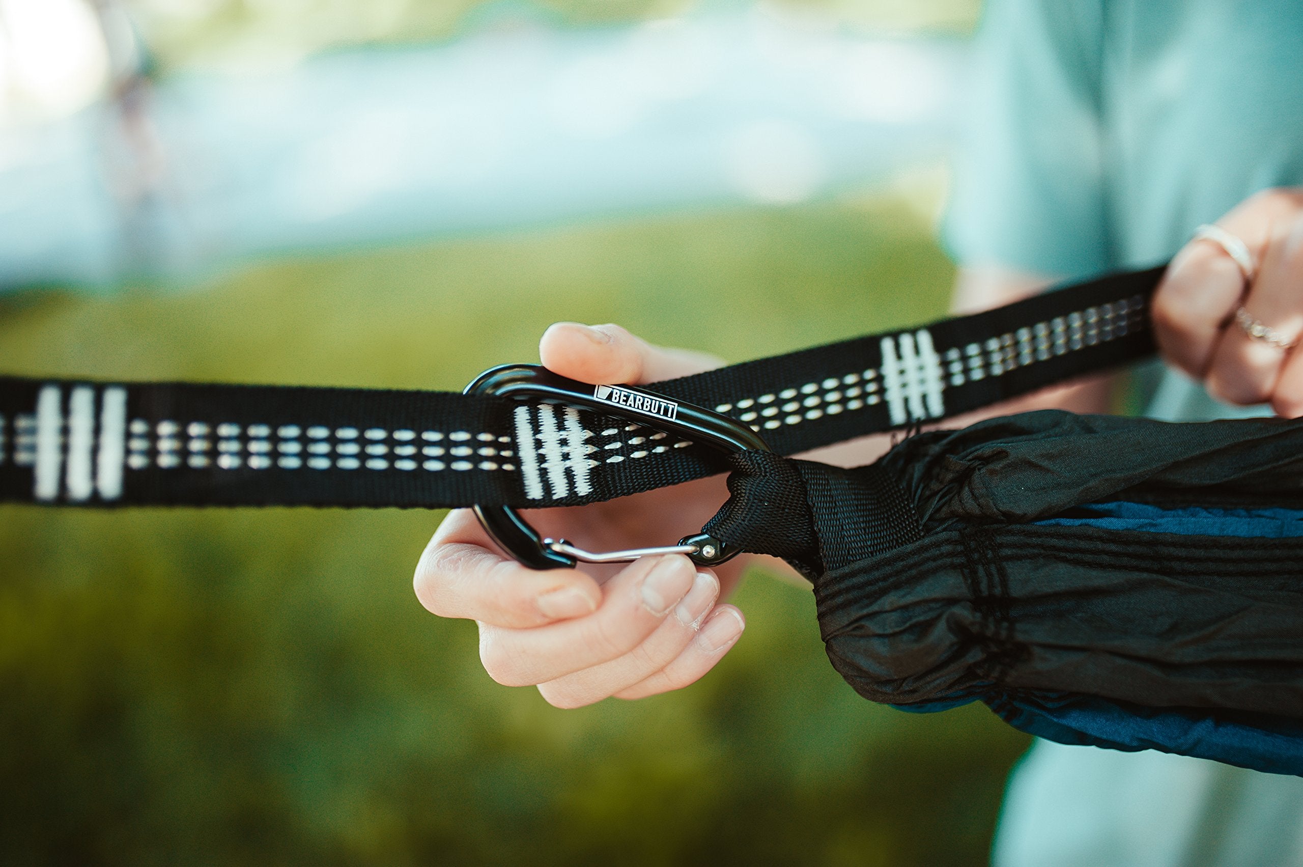 Bear Butt straps alongside ruler showing 20-foot total length