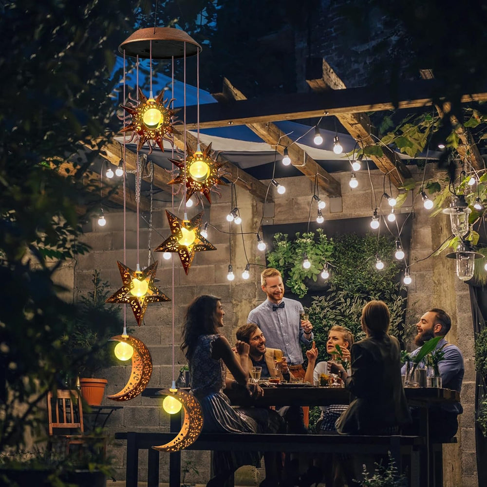 Beautyard chimes glowing at night in garden, provides gentle outdoor light