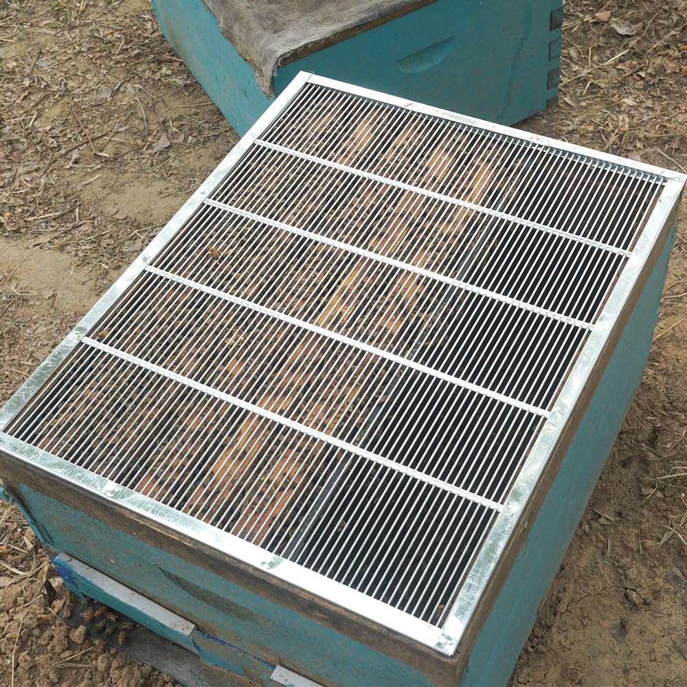 BEEXTM excluder next to a standard 10-frame showing accurate size fit