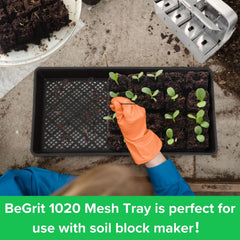 BeGrit tray holding soil blocks demonstrating stable support and improved drainage