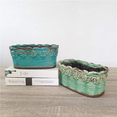 Beitewei planter next to a coffee mug showing scale and fit for small spaces