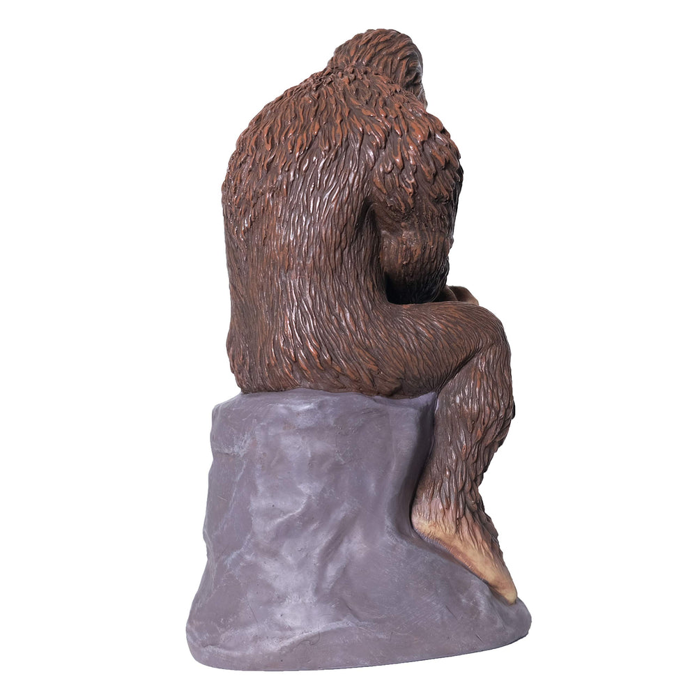 BELLA HAUS DESIGN statue placed in garden showing playful outdoor focal point