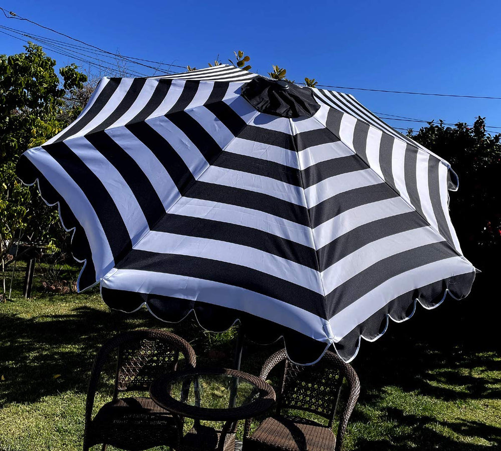 BELLRINO front view of black white scalloped canopy showing updated patio look
