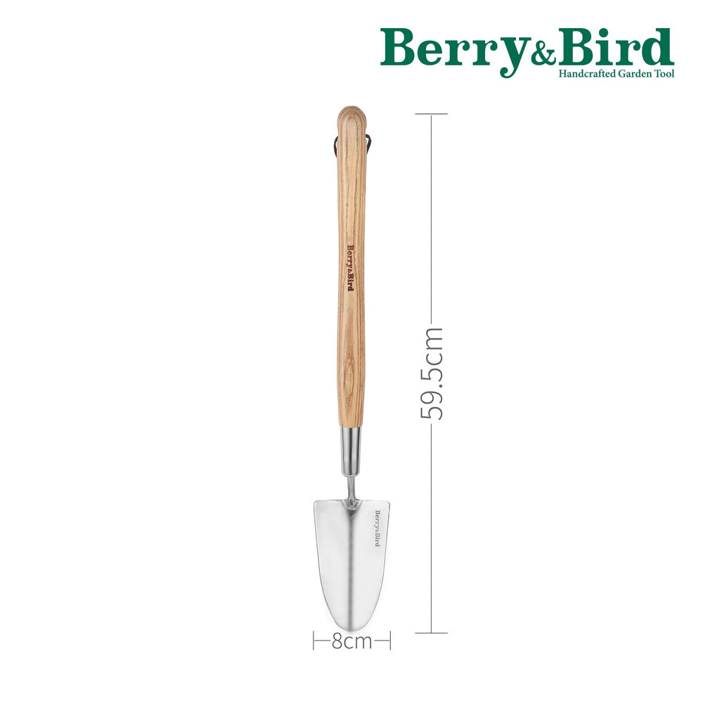 Berry&Bird trowel in use transplanting seedling demonstrating reach and control