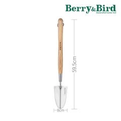 Berry&Bird trowel in use transplanting seedling demonstrating reach and control