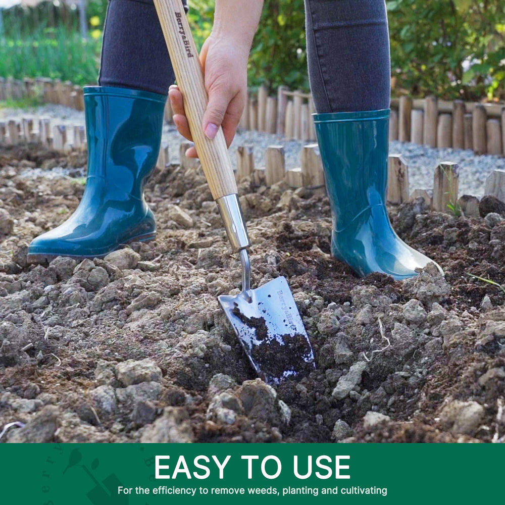 Berry&Bird trowel beside ruler showing 23.43in length for extended garden access