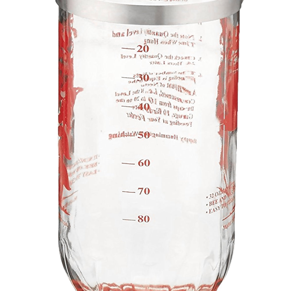 Best-1 filled feeder beside ruler showing 32 oz capacity and scale advantage