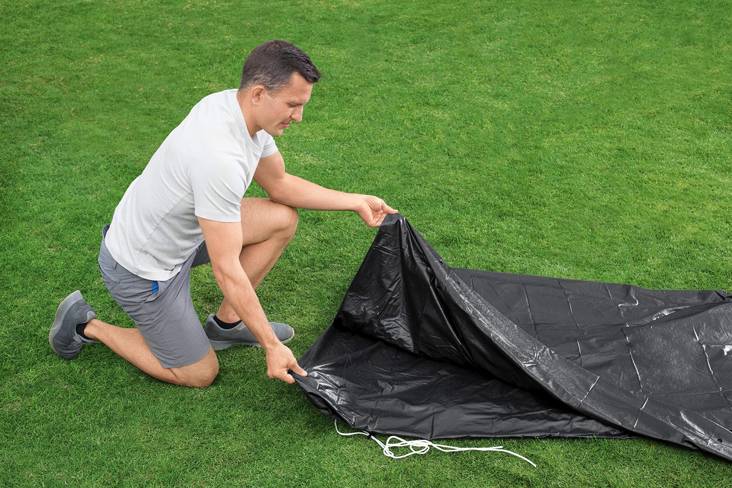 Bestway included ropes and tie points securing cover in wind