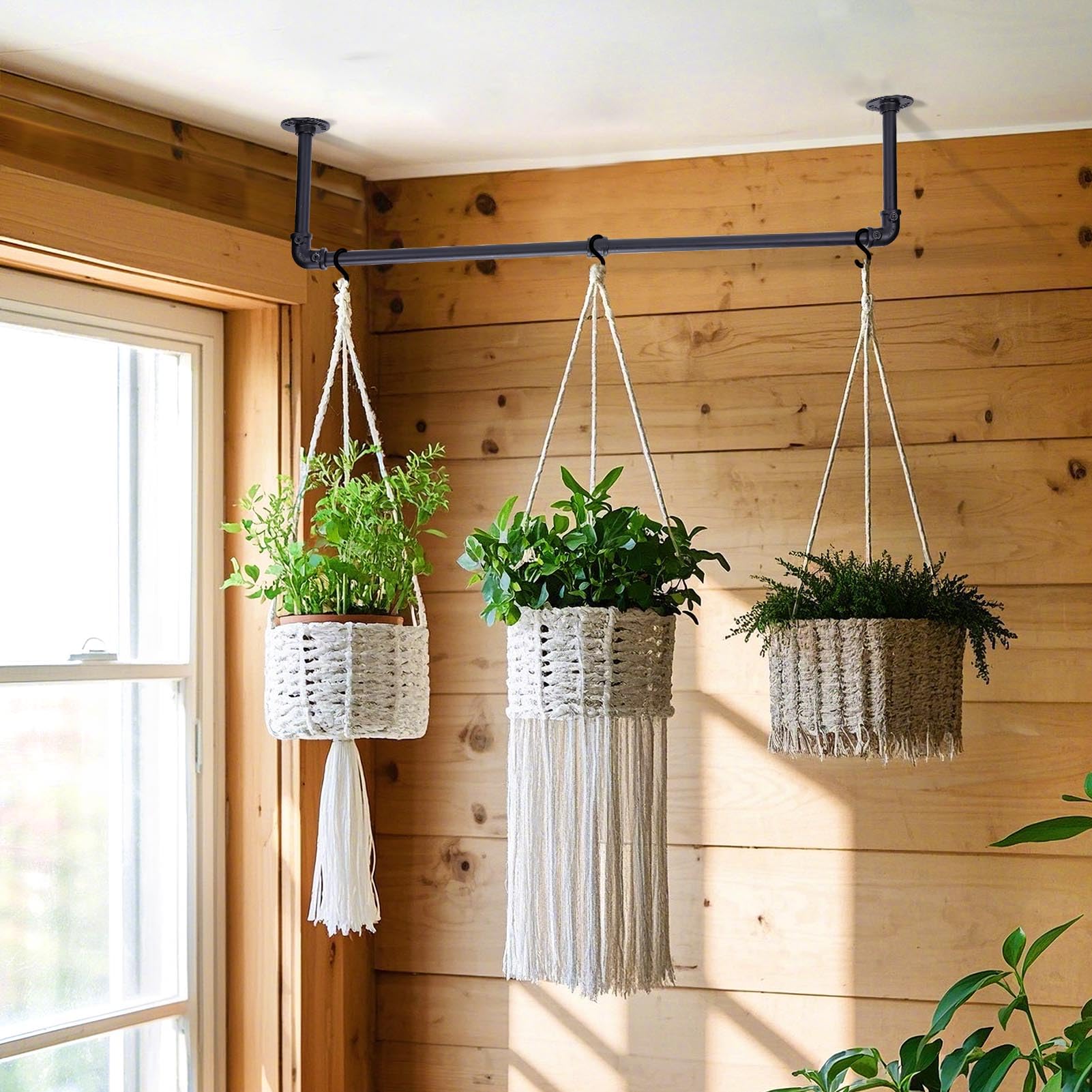 Bigmeta scale comparison with pot highlighting 34-inch span and capacity to hold medium planters