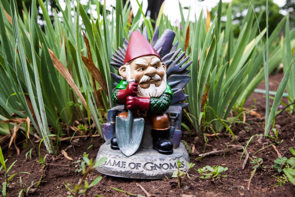 BigMouth Inc gnome in garden bed demonstrating weather-resistant finish for year-round use