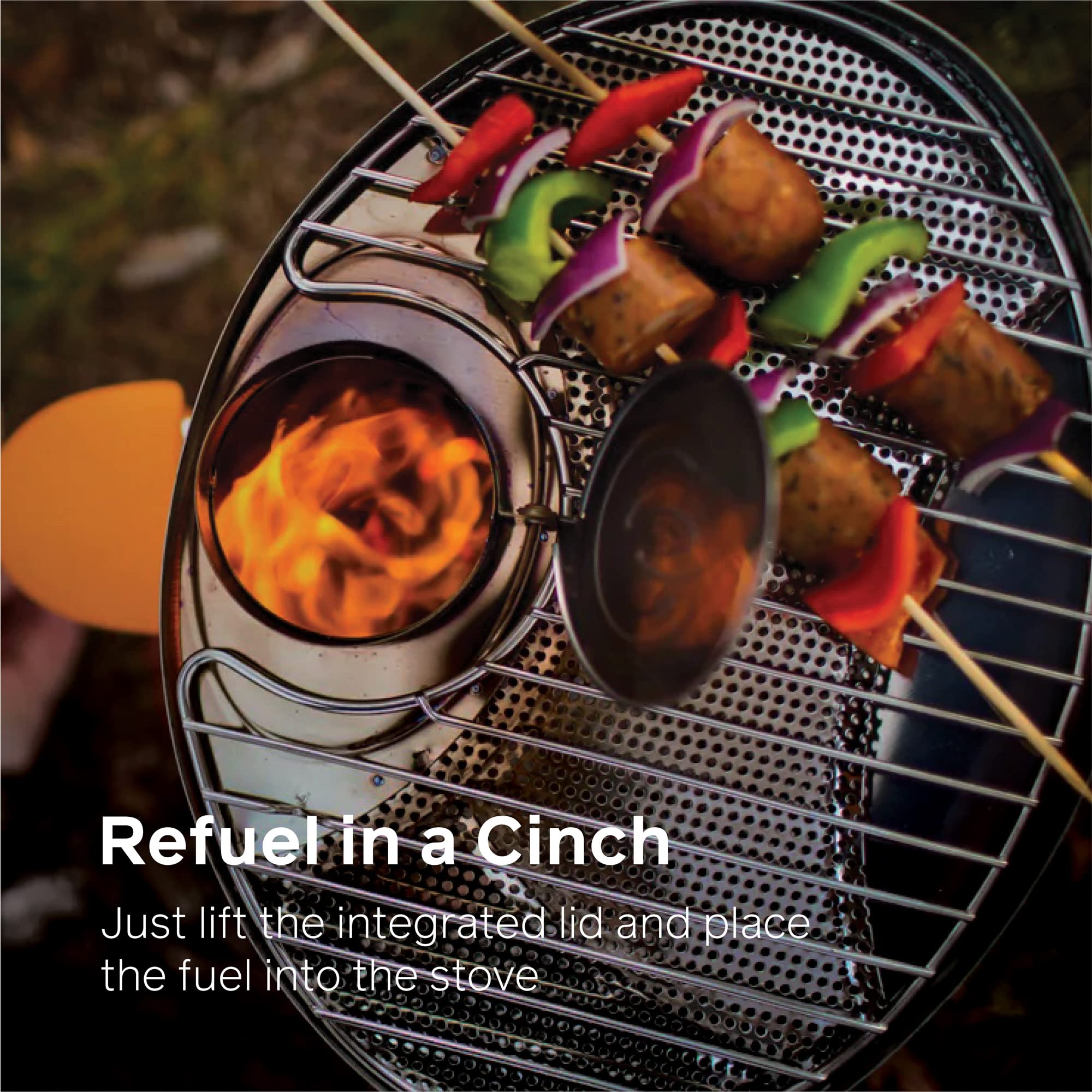 BioLite fuel intake lid open to add sticks quickly for uninterrupted grilling