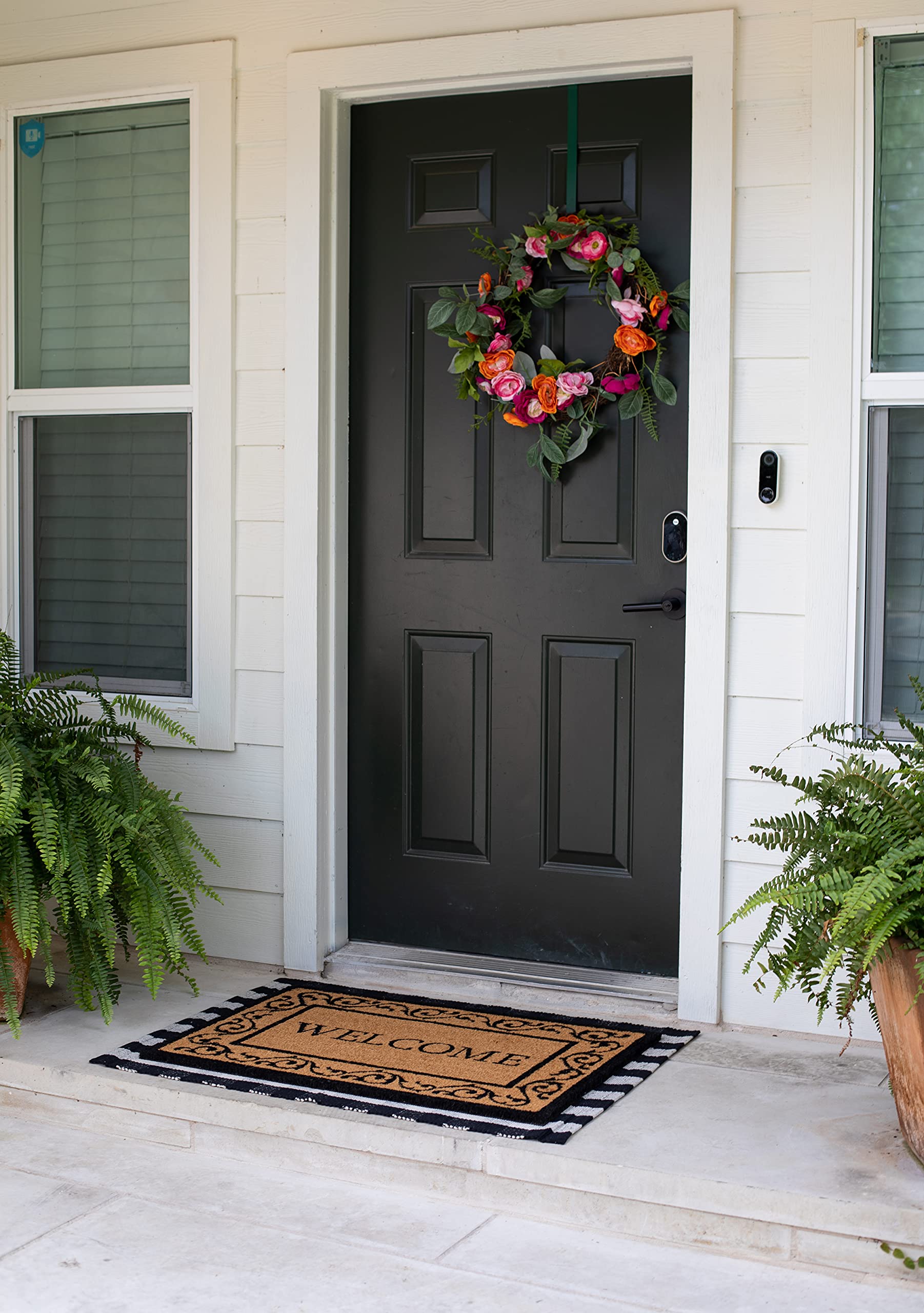 BIRDROCK HOME mat in use at a front door preventing dirt from entering home