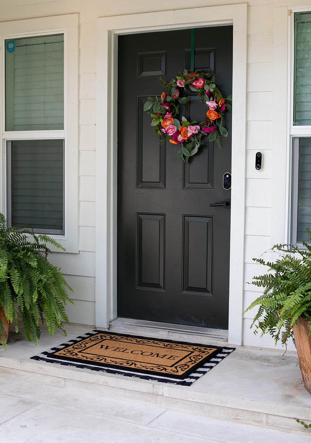 BIRDROCK HOME mat in use at a front door preventing dirt from entering home