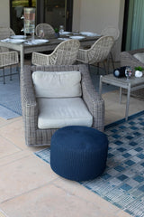 BIRDROCK HOME pouf used on patio providing comfortable footrest seating