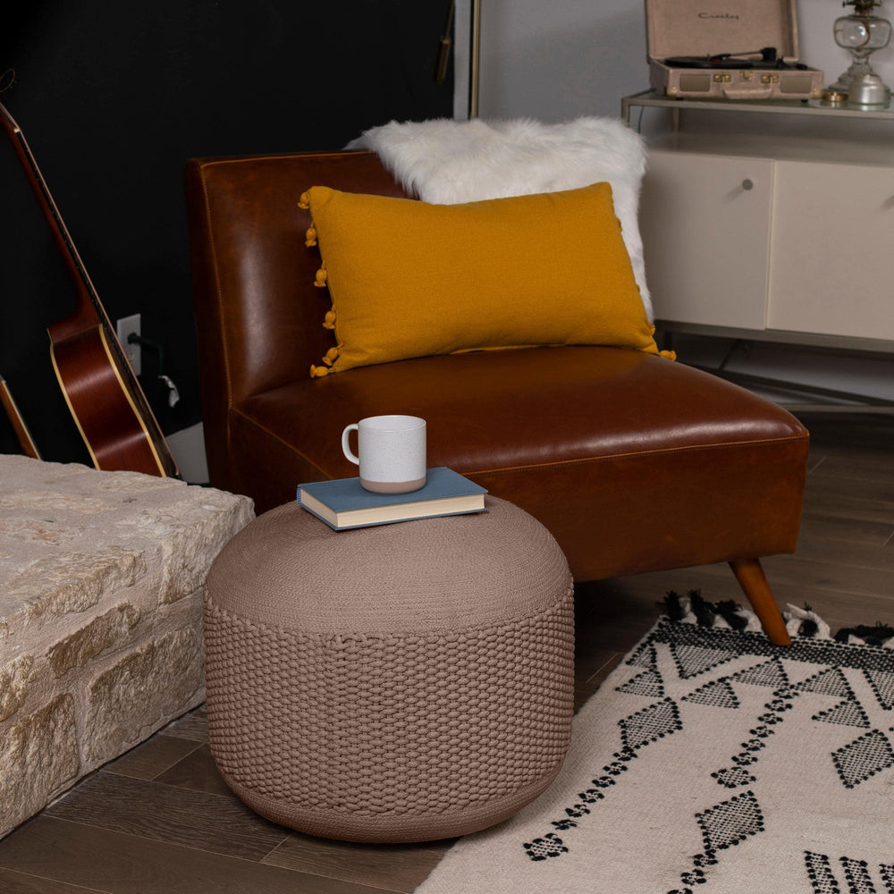 Water droplets on BIRDROCK HOME pouf surface showing water-resistant material benefit