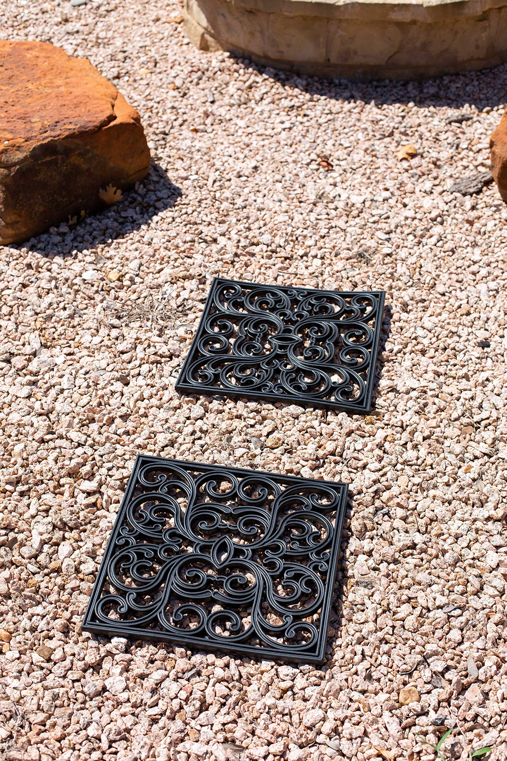 BIRDROCK HOME stones integrated in garden showing decorative pathway and plant protection