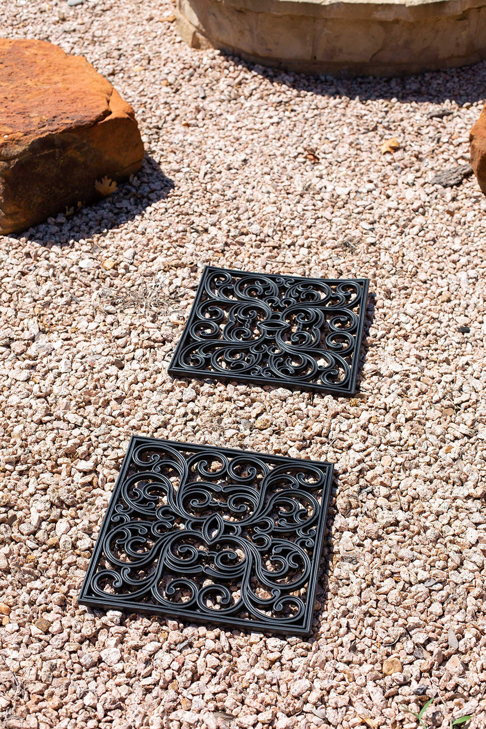 BIRDROCK HOME stones integrated in garden showing decorative pathway and plant protection