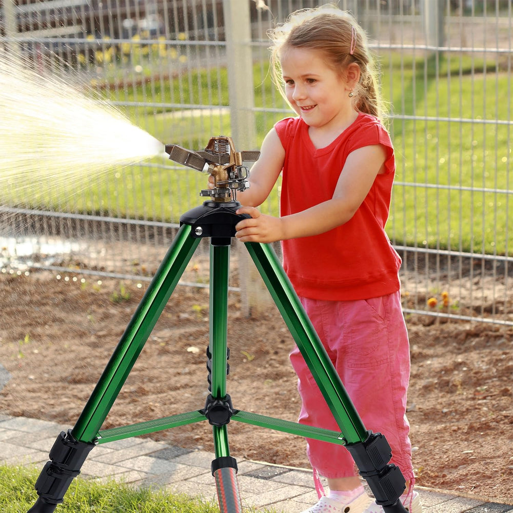 Biswing next to garden hose for scale showing compact footprint and portability
