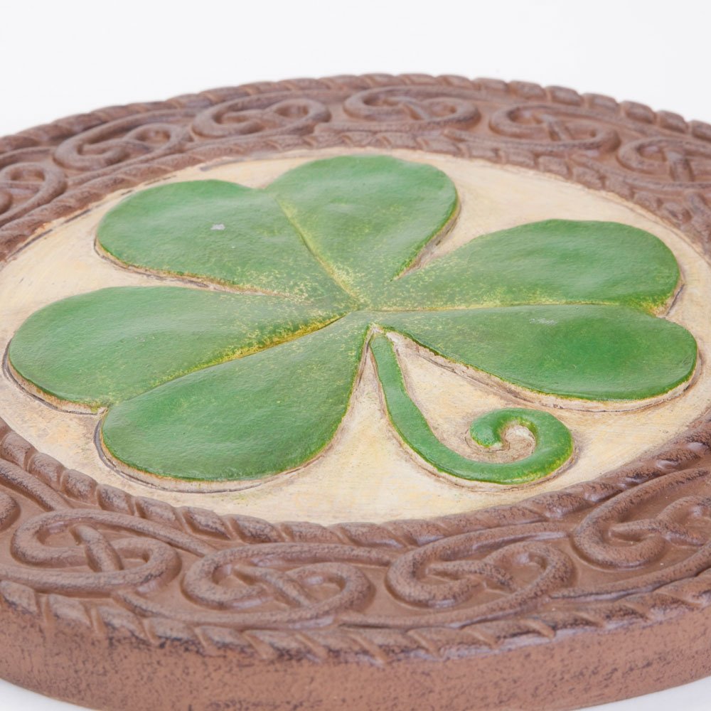 Bits and Pieces shamrock hung on fence demonstrating easy wall display and decorative use