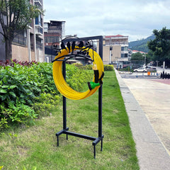 BJHGUO close detail of four anchor spikes securing the hose stand for enhanced stability