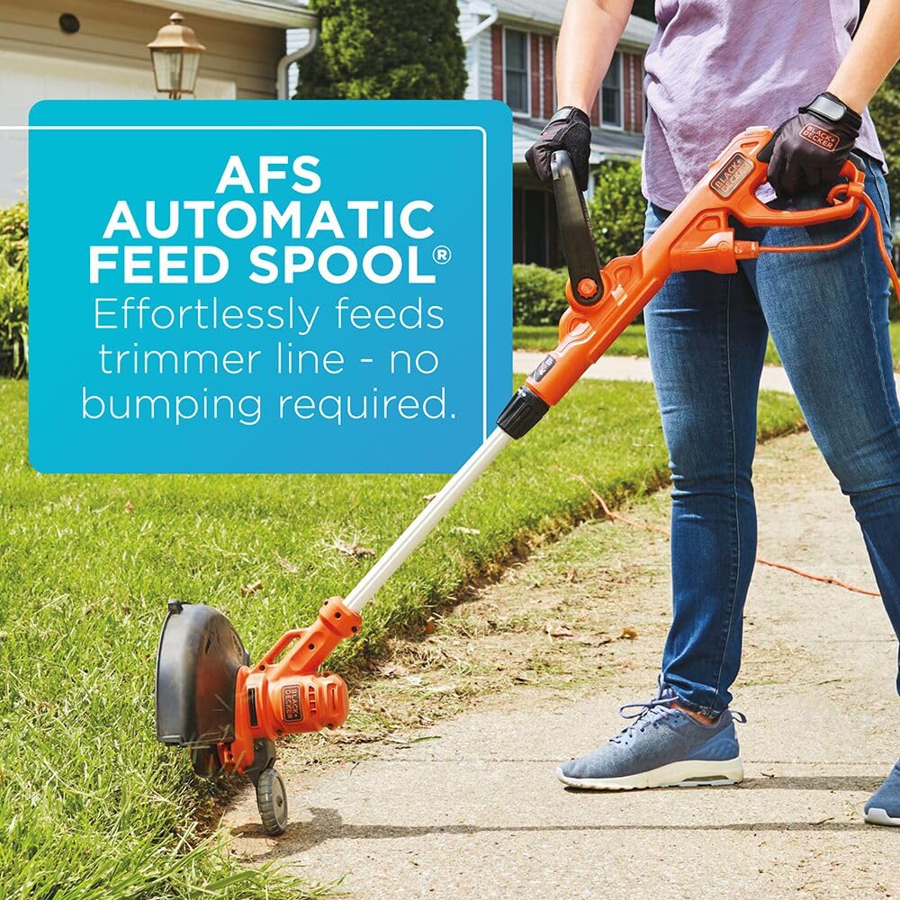 BLACK+DECKER BESTA510 trimming sidewalk grass offering fast cleanup and neat edges