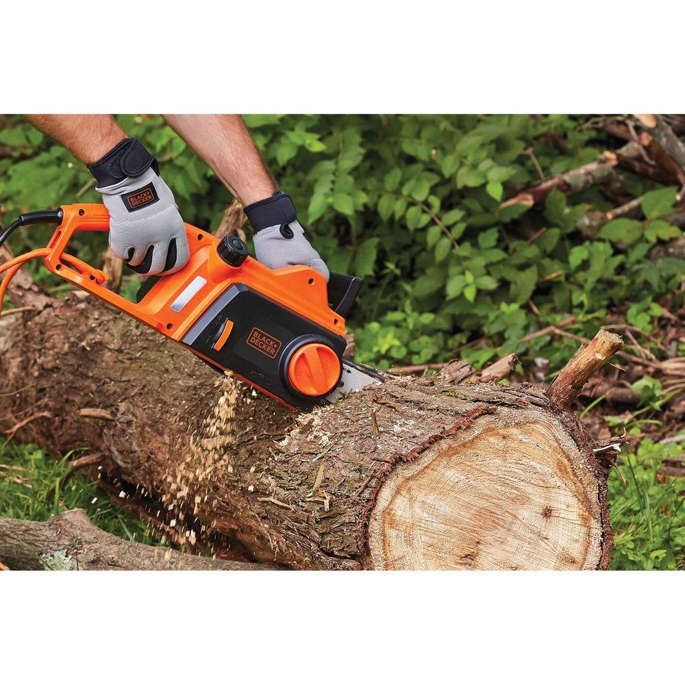 BLACK+DECKER CS1216 in use cutting a branch showcasing corded power performance