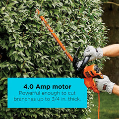 BLACK+DECKER trimmer in use cutting hedge delivering controlled precise shaping