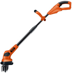 BLACK+DECKER cultivator in garden breaking up soil to prepare planting beds