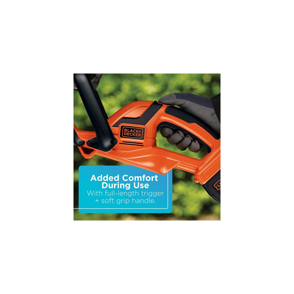 BLACK+DECKER trimmer in use cutting a hedge to demonstrate efficiency and cleaner results