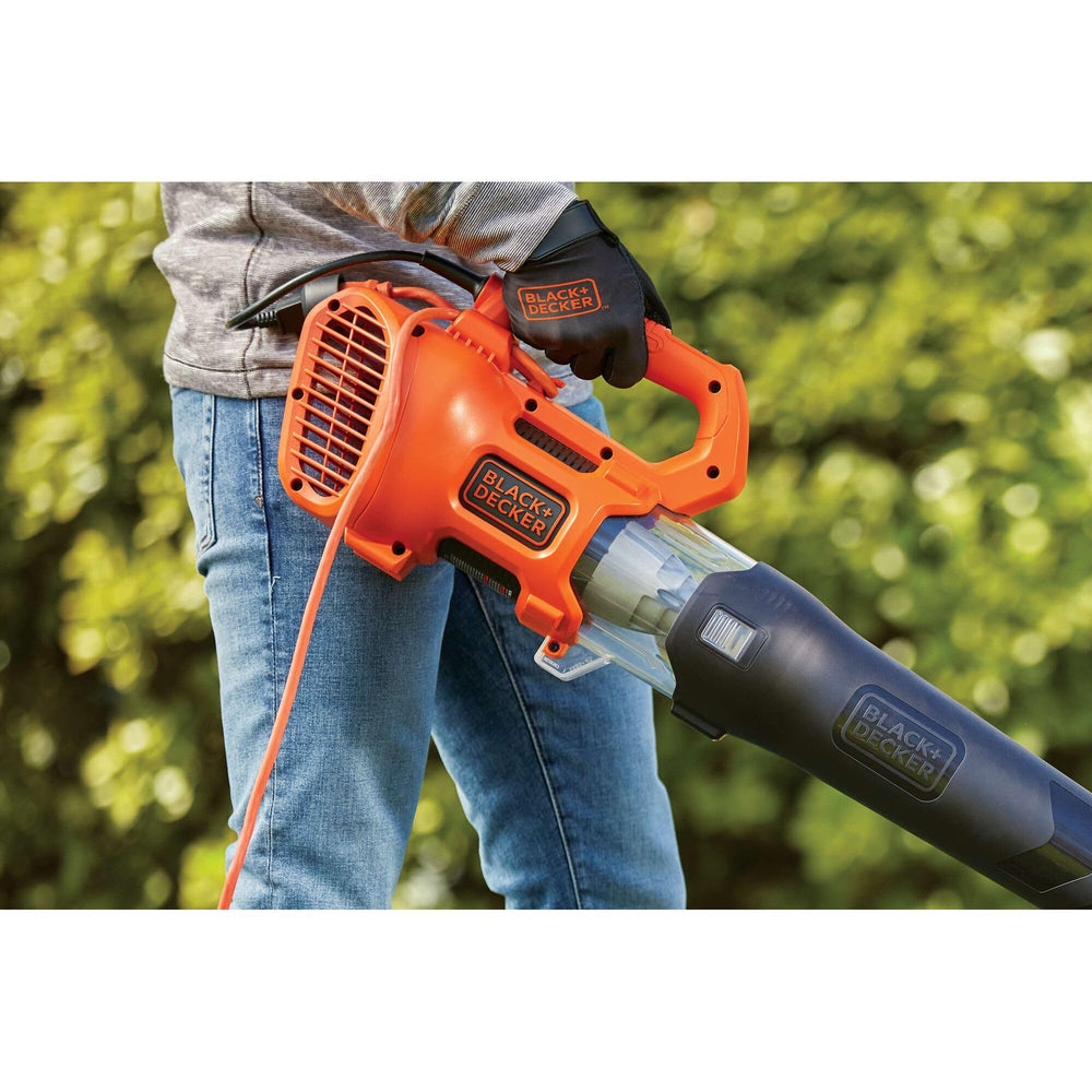 BLACK+DECKER BEBL750 in use on driveway clearing leaves quickly and neatly