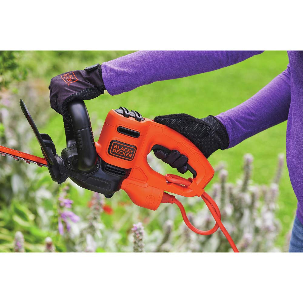 BLACK+DECKER trimmer in garden setting for tidy, maintained landscape benefit