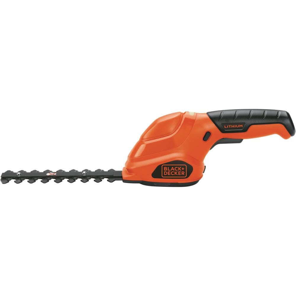 BLACK+DECKER edging grass near flowerbed for clean borders and tidy appearance