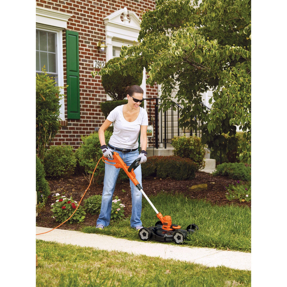 BLACK+DECKER height adjustment lever close view showing easy cutting-height customization